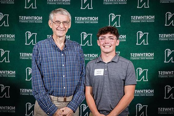 Hunter Ackley (left) is pictured with Clark Israel, a son of Lewis and Elda Israel, at Northwest's Powering Dreams celebration of donors and scholars in September. (Northwest Missouri State University photo)